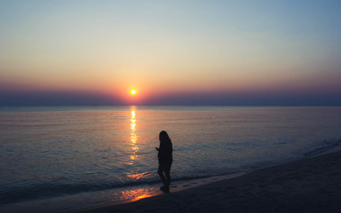 silhouette Woman in Sea Sunset