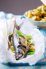 Mackerel in parchment.style rustic