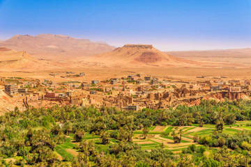 Tinghir (Tinerhir) city with Assole hill and oasis in Morocco