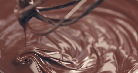mixing melted premium dark chocolate with a whisk toned, 4k photo