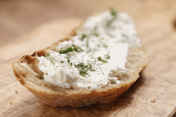 herbs on rustic bread with ricotta cheese, shallow focus