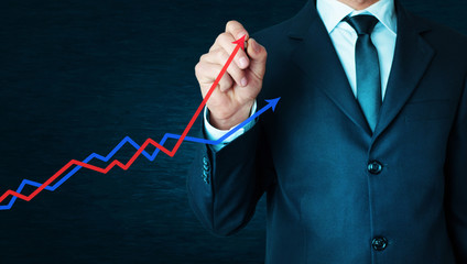 Businessman with profit chart.