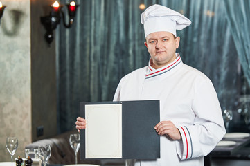 restaurant chef cook with menu card