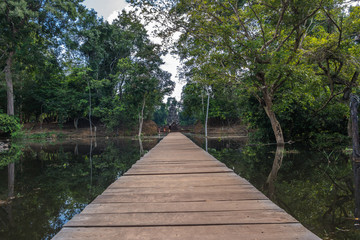 Obraz premium The path towards to Neak Pean temple on artificial island. Siem Reap, Cambodia