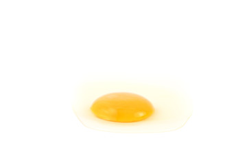 raw fresh egg without eggshell on white surface