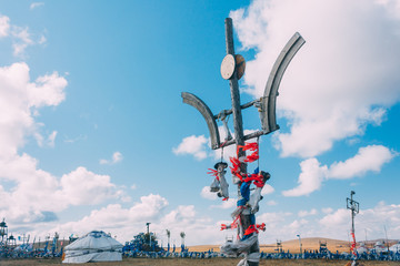 white and blue obo and aobao landscape in mongolia ,mongol totem, in grassland with blue...