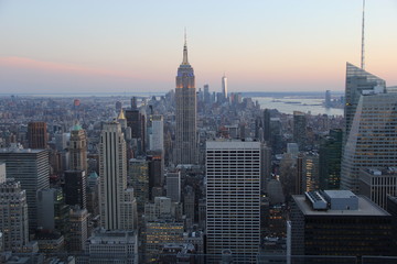 Fototapeta na wymiar View at Empire State Building at dawn from Rockefeller