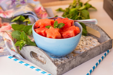 Fresh watermelon cut in star shape with mint