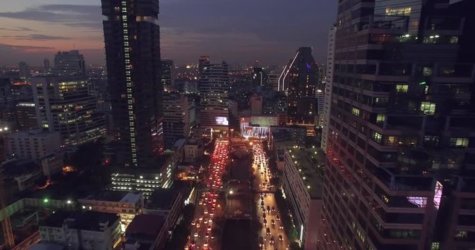 Busy Bangkok Streets at Dusk, Aerial Drone Push In Shot
