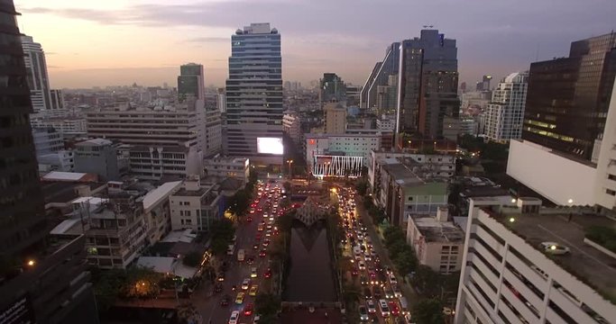 Silom District in Bangkok, Thailand, at Dusk, Ascending Aerial Shot
