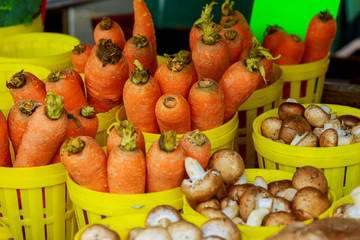farmer's market selling carrots vegetables for sale