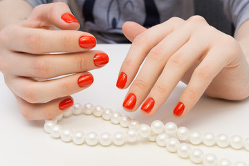 Obraz na płótnie Canvas Attractive women's hands. Natural nails with beautiful manicure.