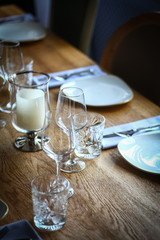 Knives, forks and plates on a table