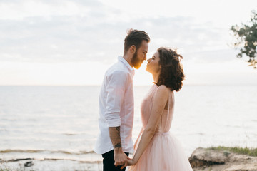 Beautiful wedding couple near the sea