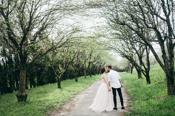  Loves and very happy groom and bride in the park
