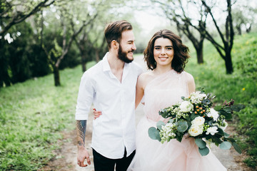  Loves and very happy groom and bride in the park