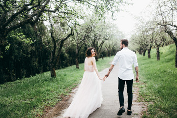  Loves and very happy groom and bride in the park
