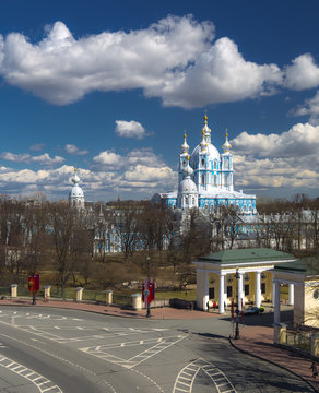 Saint-Petersburg. Russia. View from high point at the road with buses and cars. Smolny Orhtodox church cathedral.Square of proletarian dictatorship. Center of the city.