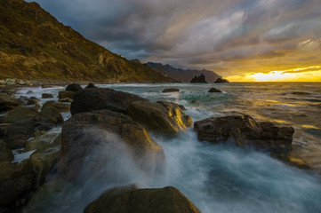 Dynamic and dramatic sunset over Benijo beach in Tenerife