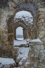 Winter landmark. Snow covered ancient fortress walls.
