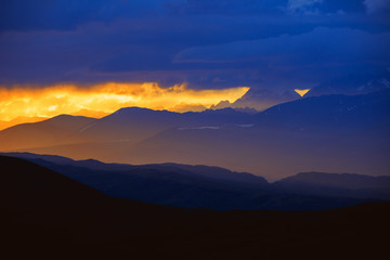 Beautiful landscape with sunset mountains