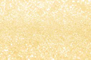 Gold abstract background with bokeh.