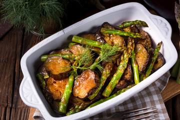 Baked eggplant with green asparagus