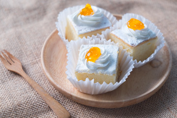Freshly baked vanilla cakes with buttercream