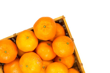 High angle view of whole ripe mandarins on white background