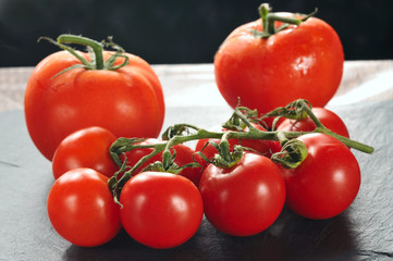 red fresh tomato with water drops