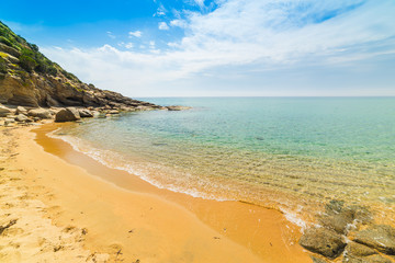 Golden shore in Solanas beach