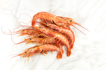 Raw shrimps on plate with copyspace