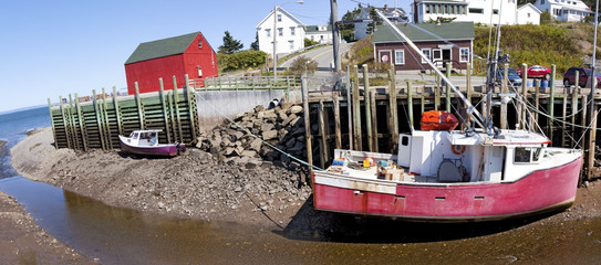 Fototapeta na wymiar Hall's Harbour is a fishing community in the Canadian province of Nova Scotia, located in Kings County on the North Mountain along the shore of the Bay of Fundy.