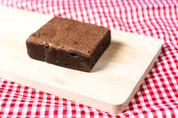 Chocolate Brownie cake on a dark plate