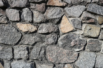 Rubble gray stone wall, rubblework