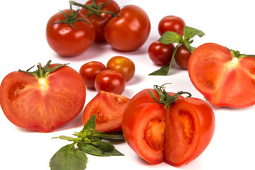 Red tomatoes on a white background, isolated