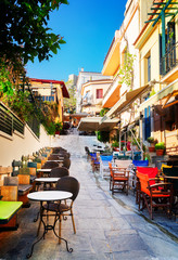 Fototapeta na wymiar small cosy street of Placa district in Athens, Greecer, retro toned
