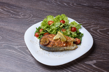 Grilled salmon on a plate