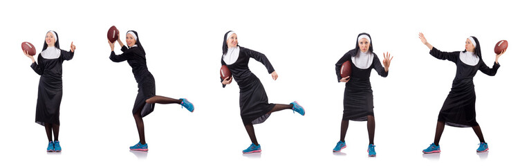Pretty nun with rugby ball isolated on white