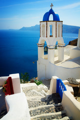 view of caldera with stairs and belfry, Oia, Santorinir, retro toned