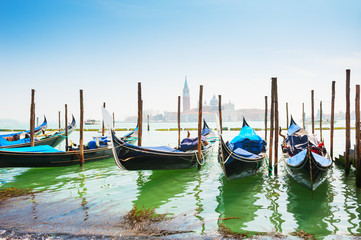 Fototapeta na wymiar Gondolas on Grand canal in Venice, Italy.