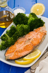fried salmon with broccoli on dish