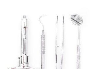 Fototapeta premium Dental tools and equipment on white background