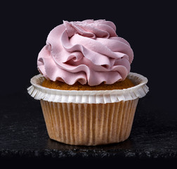 closeup cupcake on black