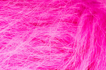 Close-Up of a pink fabric fibre with dynamic concept