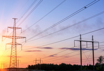 Fototapeta premium high voltage post. High-voltage tower sky background.