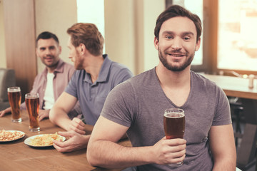 Friends having fun in pub