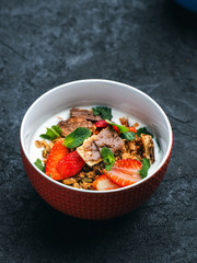 Breakfast milk bowl with granola