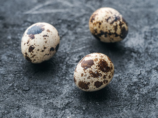 Three small quail eggs