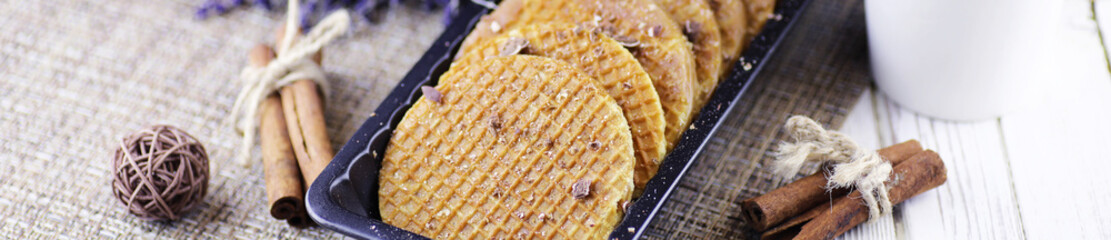 Horizontal panorama bakground of viennese wafers with caramel